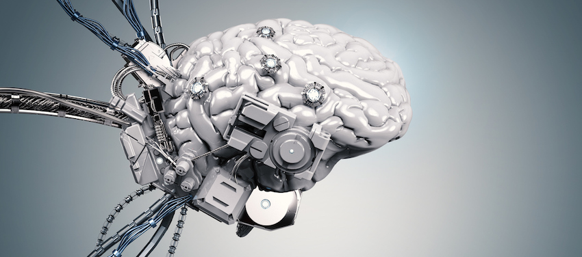 Plastic brain with electrical components and wires plugged in